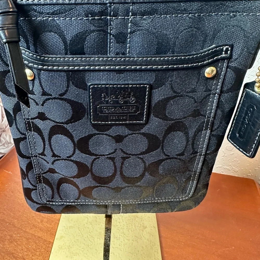 Coach Black Signature Crossbody Bag with brass hardware
